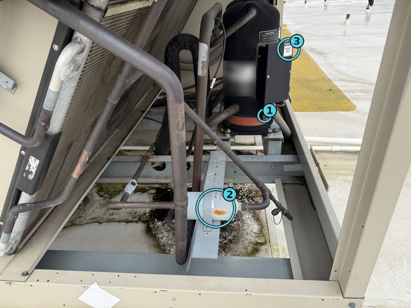 Rooftop unit compressor compartment with callouts